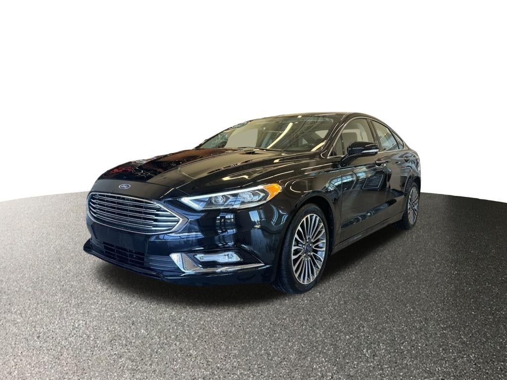 Used 2017 Ford Fusion Titanium with VIN 3FA6P0D97HR194087 for sale in Buffalo, Minnesota