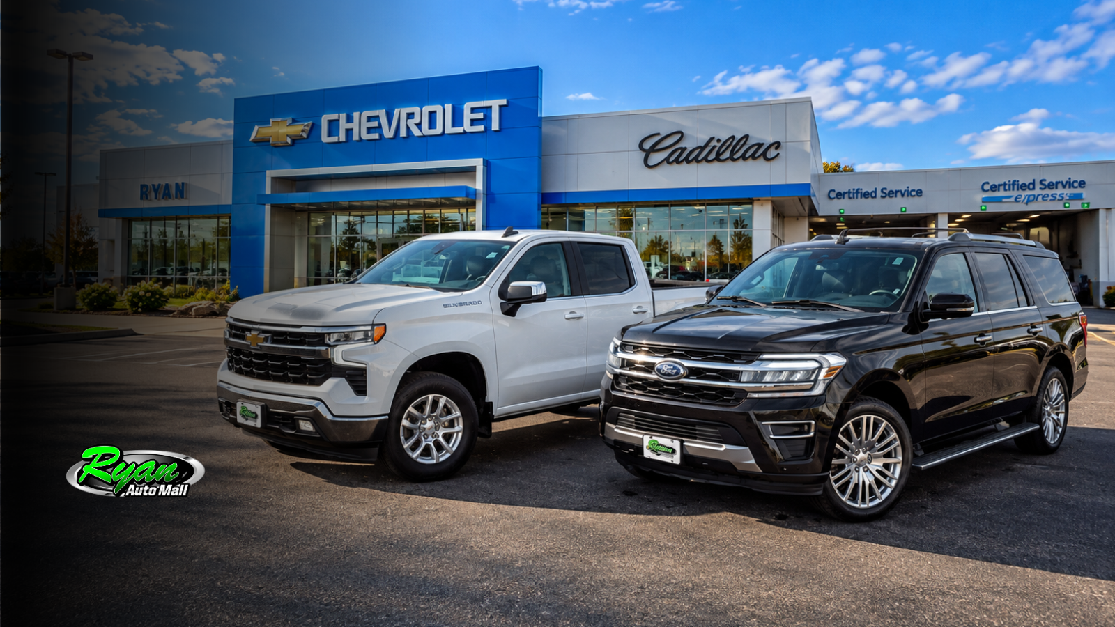 Used SUV and pickup truck parked side by side at Ryan Auto Mall